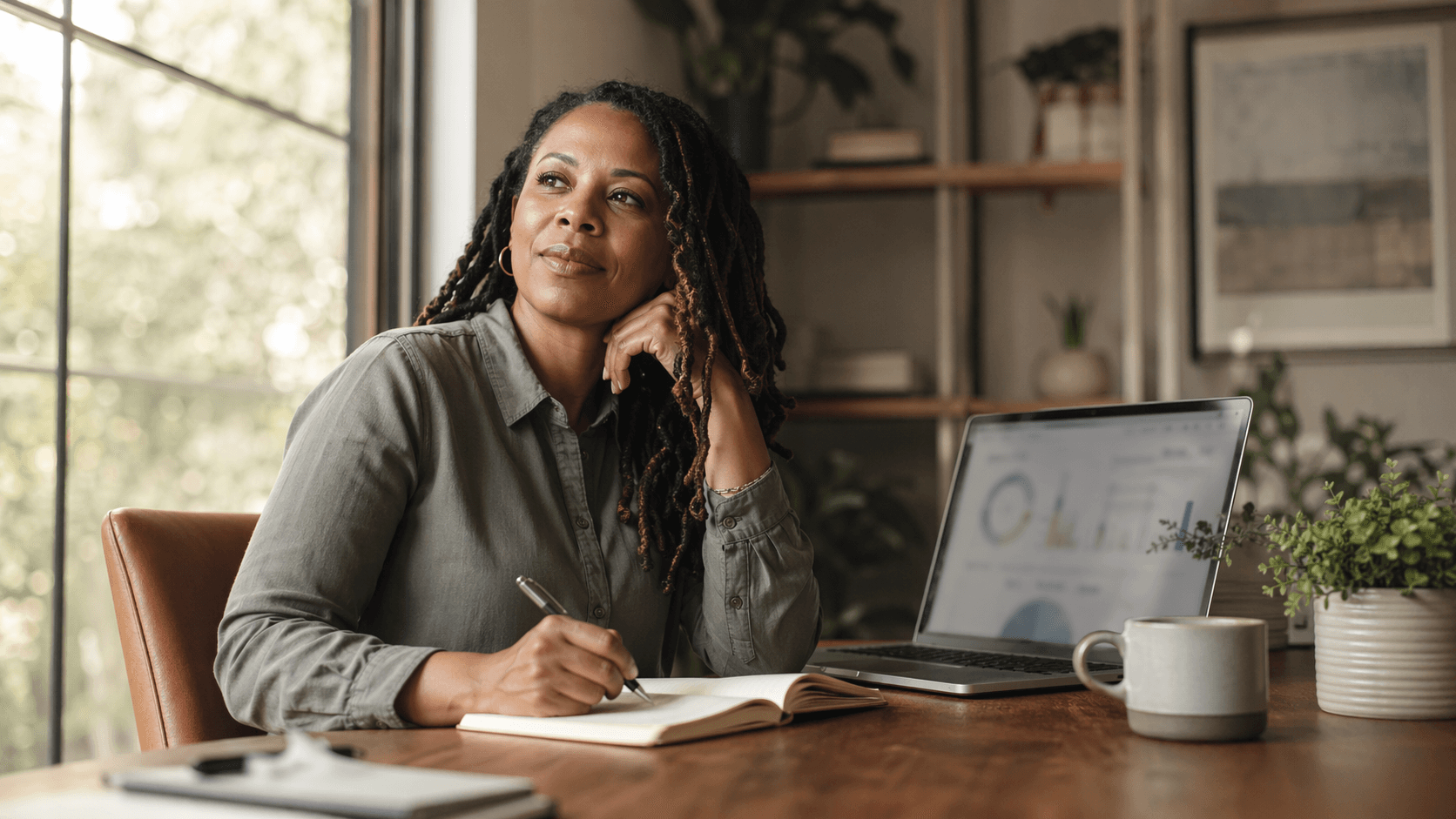 Professional reflecting on their career journey at a desk